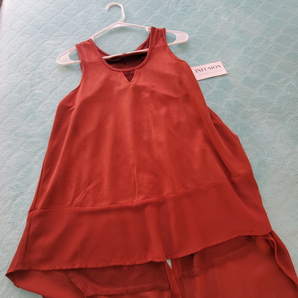 Faux suede sleeve less top.